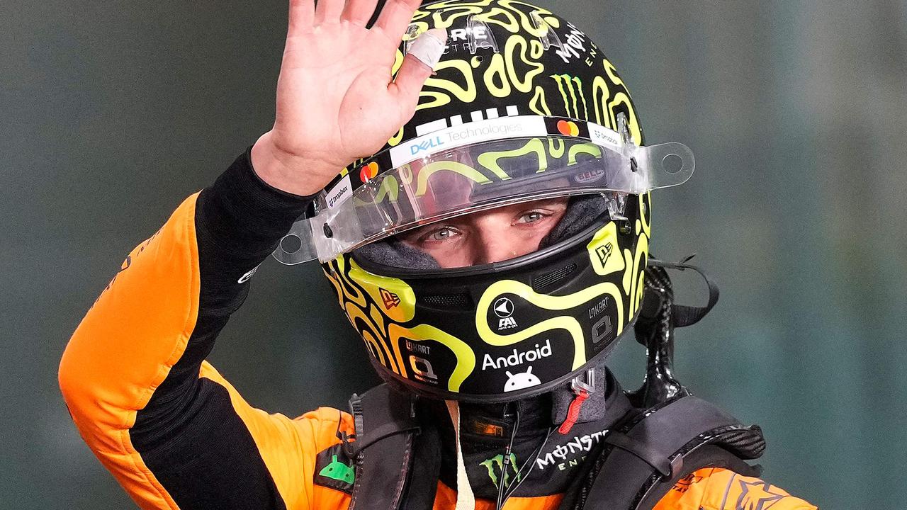 McLaren's British driver Lando Norris gestures after winning the pole position in the sprint qualifying session ahead of the Qatari Formula One Grand Prix at the Lusail International Circuit in Lusail, north of Doha, on November 29, 2024. (Photo by Darko Bandic / POOL / AFP)