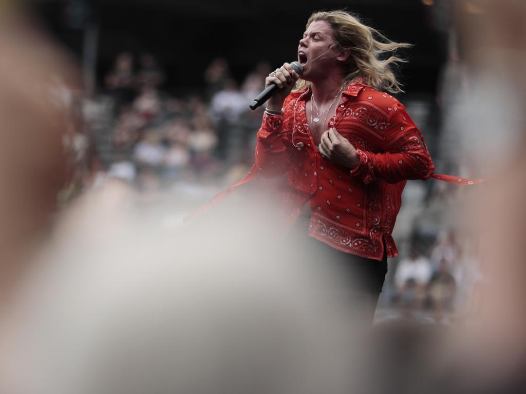 Conrad Sewell gets the crowd jumping at Fire Fight Australia. Picture: Getty Images