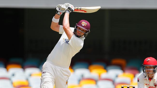 Matt Renshaw hits out for Queensland at the Gabba on Thursday.