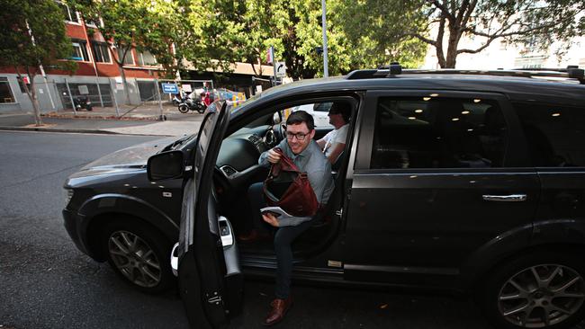 Gary Hamilton-Irvine arrives at Holt St, Surry Hills in his Uber. Photo: Adam Yip