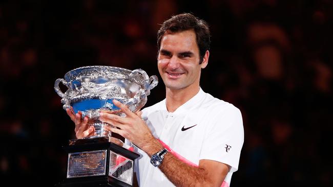 MELBOURNE, AUSTRALIA - JANUARY 28:  Roger Federer of Switzerland poses with the Norman Brookes Challenge Cup after winning the 2018 Australian Open Men's Singles Final against Marin Cilic of Croatia on day 14 of the 2018 Australian Open at Melbourne Park on January 28, 2018 in Melbourne, Australia.  (Photo by Michael Dodge/Getty Images)