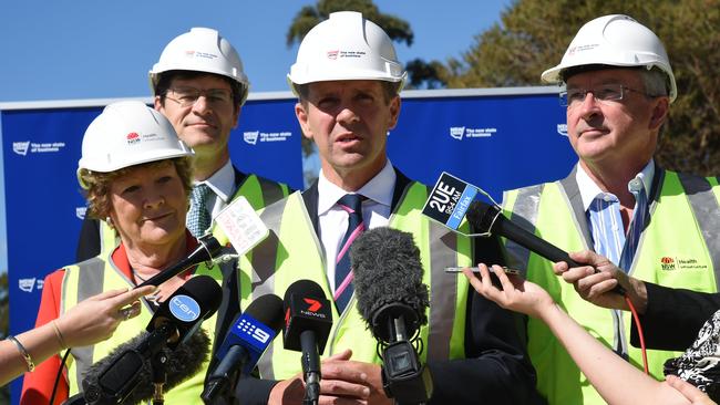 Premier Mike Baird speaking with Health Minister Jillian Skinner, local MP Jonathon O'Dea and Attorney General of NSW Brad Hazzard. Picture: Annika Enderborg