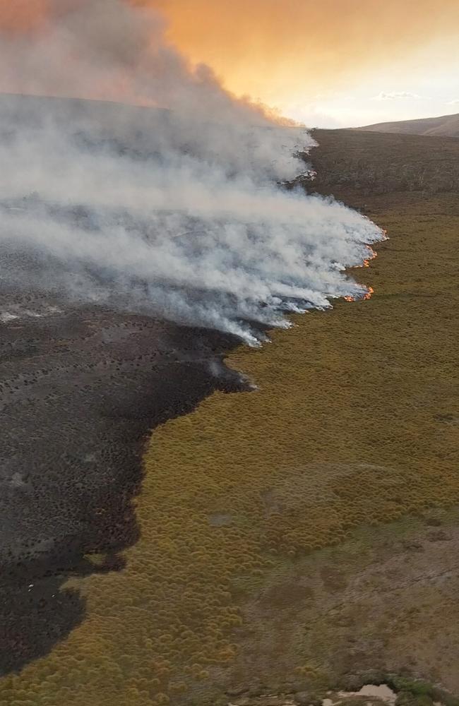 Remote area firefighting at Canning Peak. Bushfires are affecting the West Coast area of Tasmania. Picture: Tasmania Parks and Wildlife Service