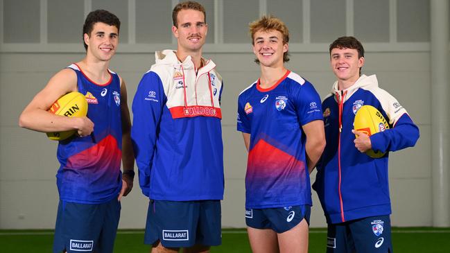 Western Bulldogs draftees Joel Freijah, Lachlan Smith, Ryley Sanders and Aiden O’Driscoll at Whitten Oval on Monday. Picture: Morgan Hancock / Getty Images