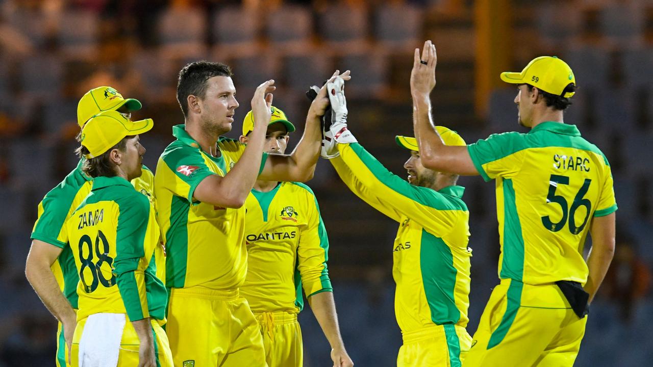 The Australians are hoping to celebrate a win in game three of their T20 series against the West Indies. Picture: Randy Brooks / AFP