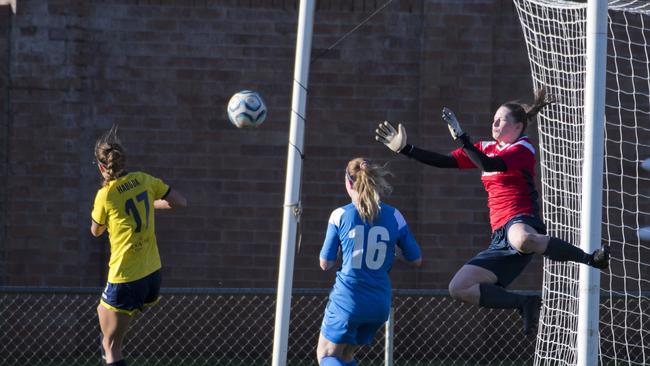 South West Queensland Thunder keeper Elizabeth Hollitt saves a shot.