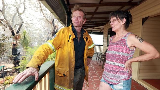 Hero firefighter Chris Saul with Karl Andersson's daughter, Trudy All, 50. Picture: Gary Ramage