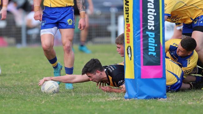 Jets winger Beau Luland reaches out to score. Picture: Steve Montgomery/Ourfootyteam