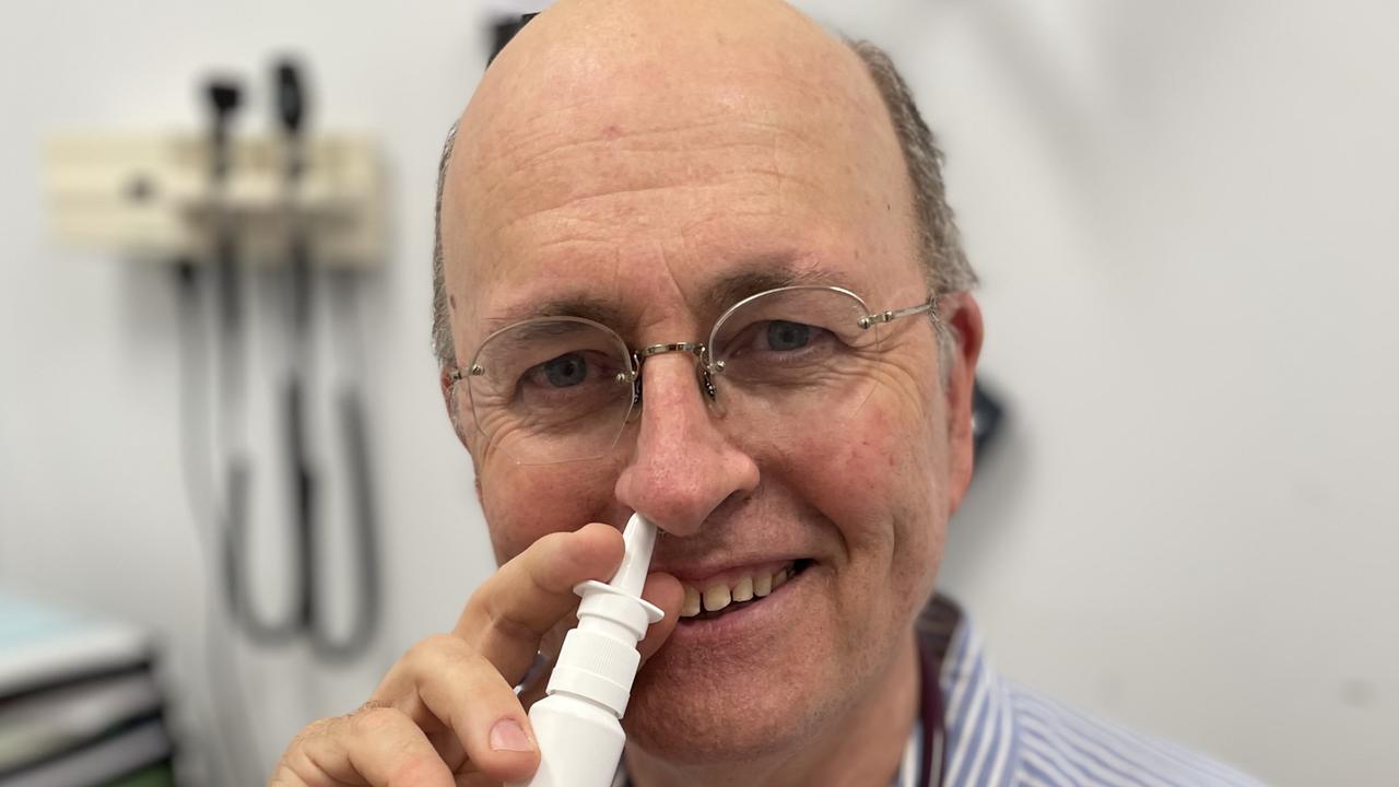 Professor Don Campbell demonstrating the nasal Heparin Spray. Picture: Supplied.