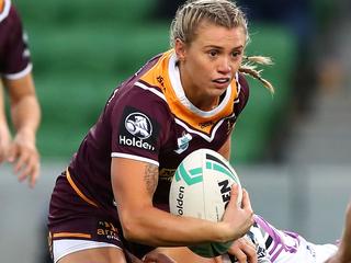 MELBOURNE, AUSTRALIA - SEPTEMBER 21: Julia Robinson of the Broncos is tackled by the Warriors defence during the round three NRLW match between the Brisbane Broncos and the New Zealand Warriors at AAMI Park on September 21, 2018 in Melbourne, Australia. (Photo by Kelly Defina/Getty Images)