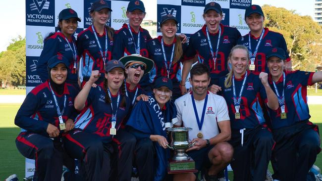 Dandenong shows off the premiership cup. Pic: Chris Thomas, Cricket Victoria.