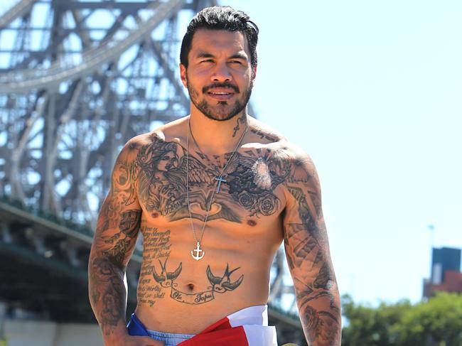 Digby Ioane displaying some of his tattoos. Picture: Annette Dew