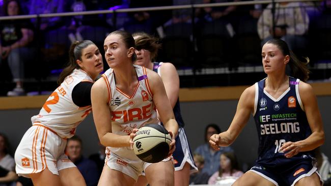 GEELONG, AUSTRALIA - OCTOBER 30: Courtney Woods of the Townsville Fire handles the ball during the round one WNBL match between Geelong United and Townsville Fire at The Geelong Arena, on October 30, 2024, in Geelong, Australia. (Photo by Kelly Defina/Getty Images)