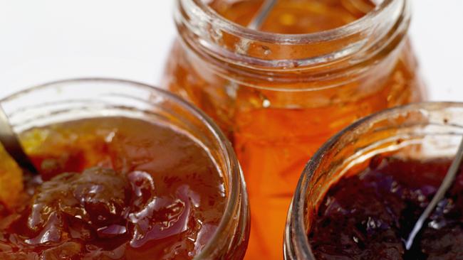 Close-up of three jars of assorted jams and marmalade. istock photo. For Greg's column.