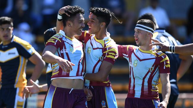 Blake Scott (R) celebrates Keebra Park’s GIO Schoolboy Cup win in Sydney in 2017.