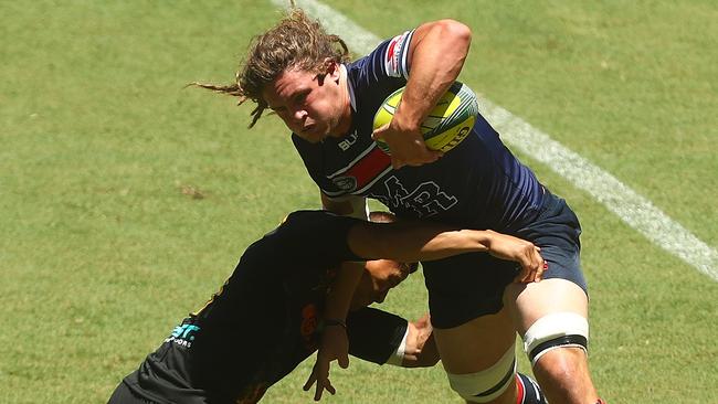 BRISBANE, AUSTRALIA - FEBRUARY 11: Jordy Reid of the Rebels is tackled during the Rugby Global Tens match between Rebels and Chiefs at Suncorp Stadium on February 11, 2017 in Brisbane, Australia. (Photo by Chris Hyde/Getty Images)