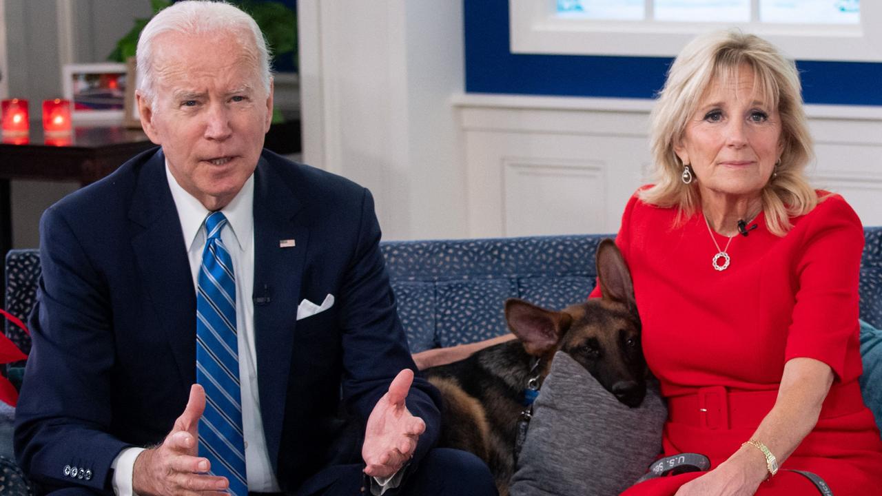 US President Joe Biden and US First Lady Jill Biden with their dog Commander. Picture: SAUL LOEB / AFP