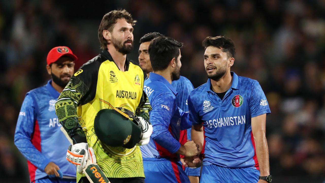 Kane Richardson is dismissed against Afghanistan at the T20 World Cup. (Photo by Sarah Reed/Getty Images)