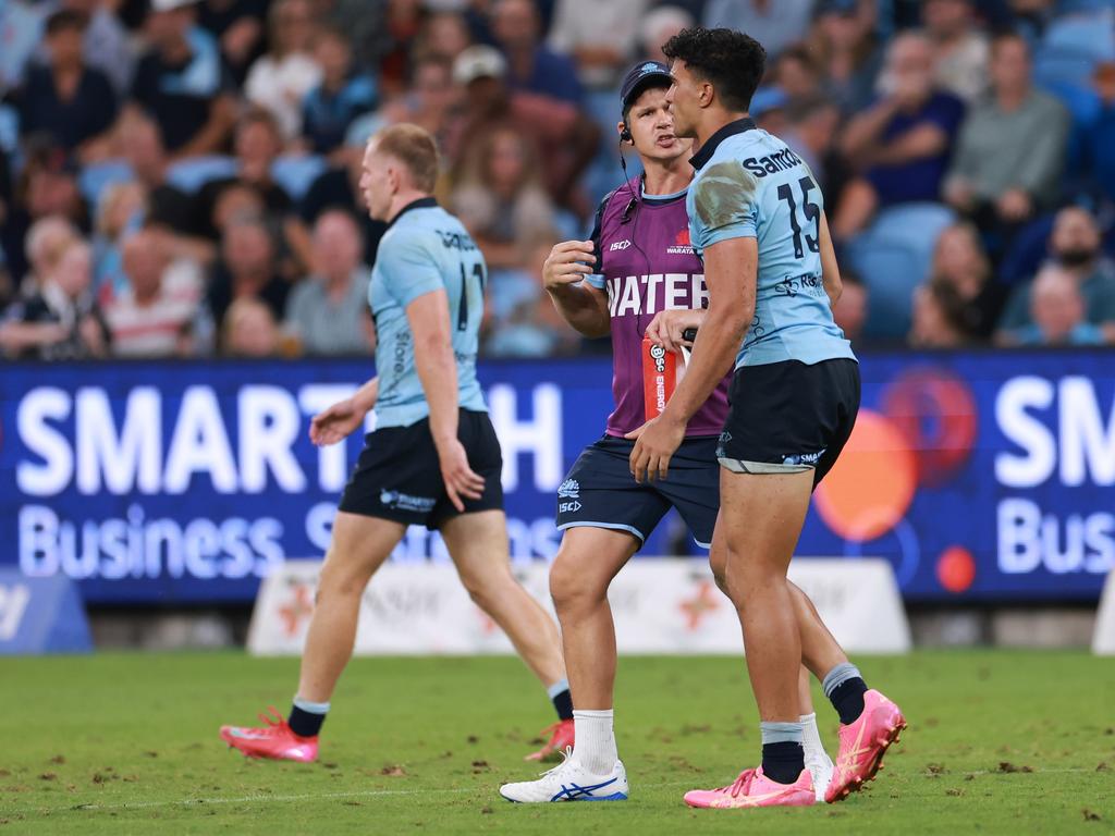 SYDNEY, AUSTRALIA – FEBRUARY 14: Joseph-Aukuso Suaalii of the Waratahs limps after a heavy tackle during the round one Super Rugby Pacific match between NSW Waratahs and Highlanders at Allianz Stadium, on February 14, 2025, in Sydney, Australia. (Photo by Darrian Traynor/Getty Images)