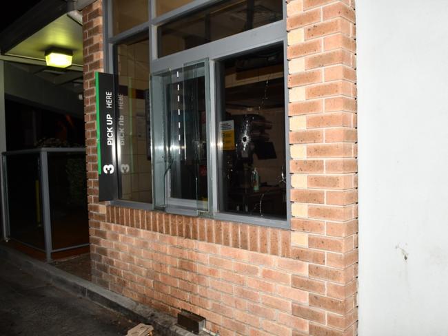 The bullet hole in the window of the McDonald's drive-thru at Bridgewater.