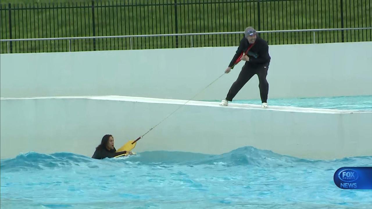 Jarome Luai is assisted from a wave pool on Tuesday morning.