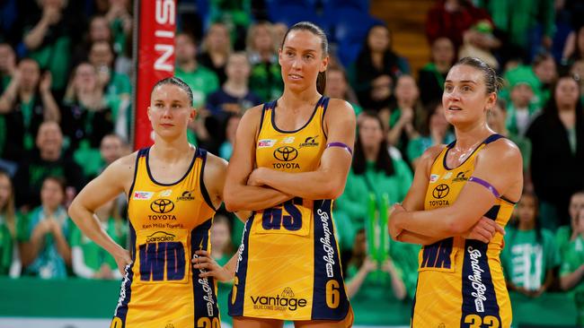 Mahalia Cassidy, Cara Koenen, Liz Watson of the Lightning react after their 2024 semi final loss. Picture: James Worsfold/Getty Images.