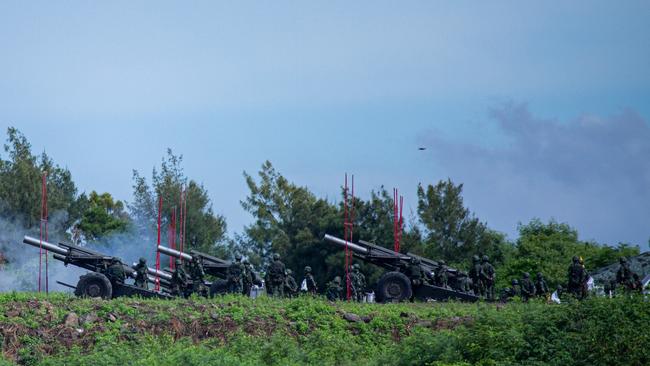 Taiwanese gunners hold a live-fire drill on Wednesday. Picture: Getty Images