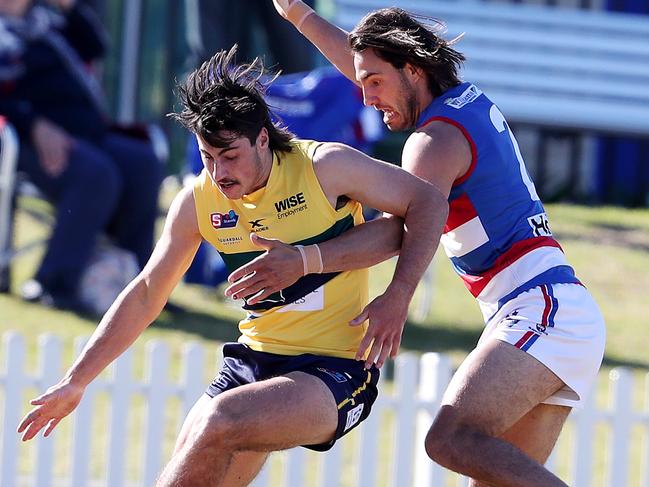 Eagles’ Lachlan Jones and Centrals Troy Menzel. Picture: Sarah Reed