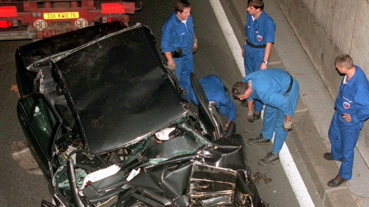 Police services prepare to take away the damaged car in the Pont d'Alma tunnel in Paris in which Princess Diana was killed. Picture: AP Photo/Jerome Delay