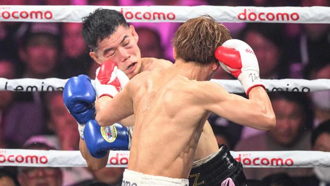 Kim Ye-joon was an unfortunate punching bag. Photo by Philip FONG / AFP)