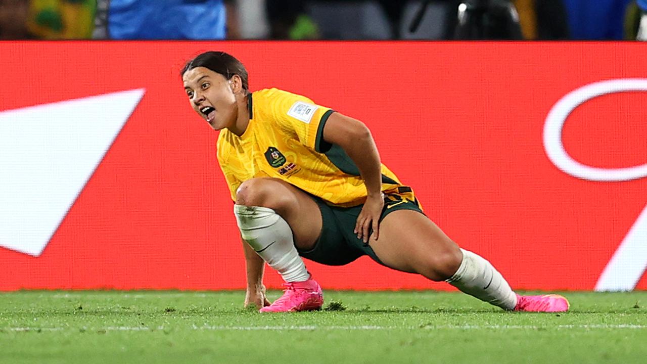 SYDNEY, AUSTRALIA – AUGUST 07: Sam Kerr of Australia slips during the FIFA Women's World Cup Australia &amp; New Zealand 2023 Round of 16 match between Australia and Denmark at Stadium Australia on August 07, 2023 in Sydney / Gadigal, Australia. (Photo by Brendon Thorne/Getty Images )