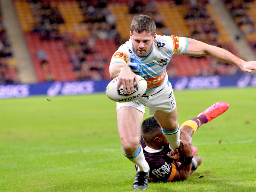 Don on his way to scoring one of his 85 tries for the Titans. Picture: Bradley Kanaris/Getty Images