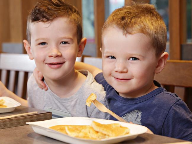 (LR) Jimmy Egan (5) and Sean Egan (3) using the new wooden cutlery at McDonaldâ€™s Haberfield on the 29th of February 2020. Picture supplied by McDonalds