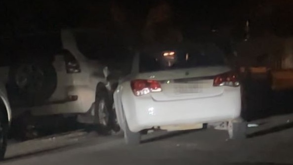 The Holden Cruze after crashing into a white Toyota Landcruiser. Picture: Supplied