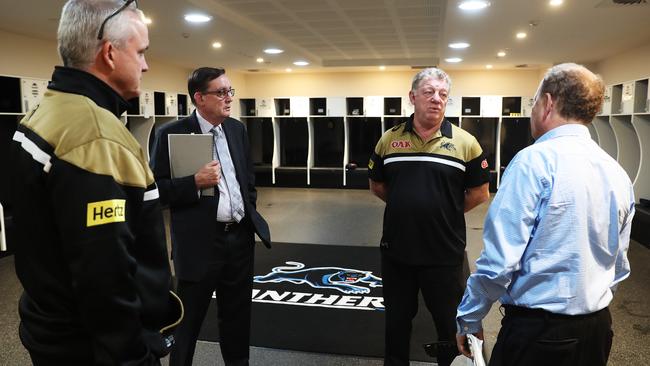 Buzz and Gus with Penrith coach Anthony Griffin and CEO Brian Fletcher. Photo: Brett Costello