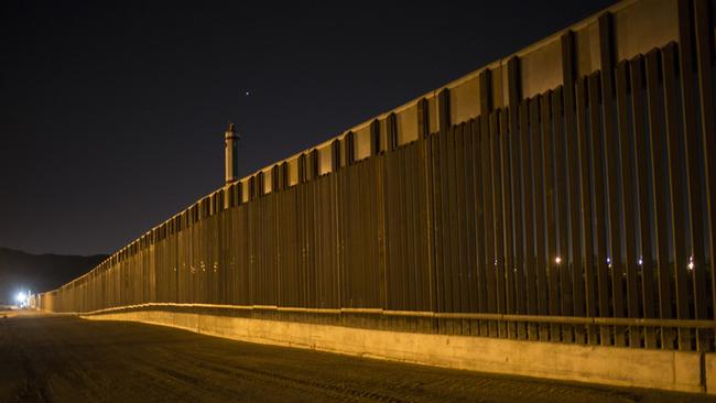 A portion of the new steel fence stretches along the border in New Mexico. Picture: Rodrigo Abd