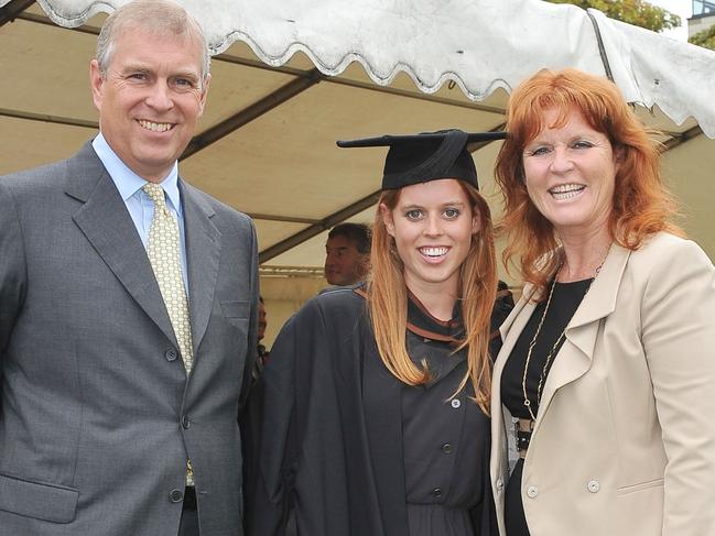 Prince Andrew (L), Sarah, Duchess of York (R) and their daughter, Princess Beatrice, following her graduation. Andrew has continued to battle fallout from the Jeffrey Epstein case. Picture: WPA Pool/Getty Images