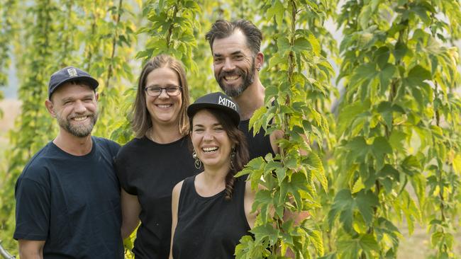 This picture, of Tim and Jen Cabelka, Chris Rowe and Alec Pennington, tells two important stories. Picture: Zoe Phillips