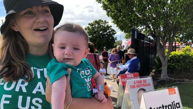 Greens volunteer Lissy Gauranich at an Upper Coomera booth with son Joey.