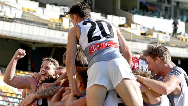 Power teammates swamp Robbie Gray after the goal. Picture: Bradley Kanaris (Getty)