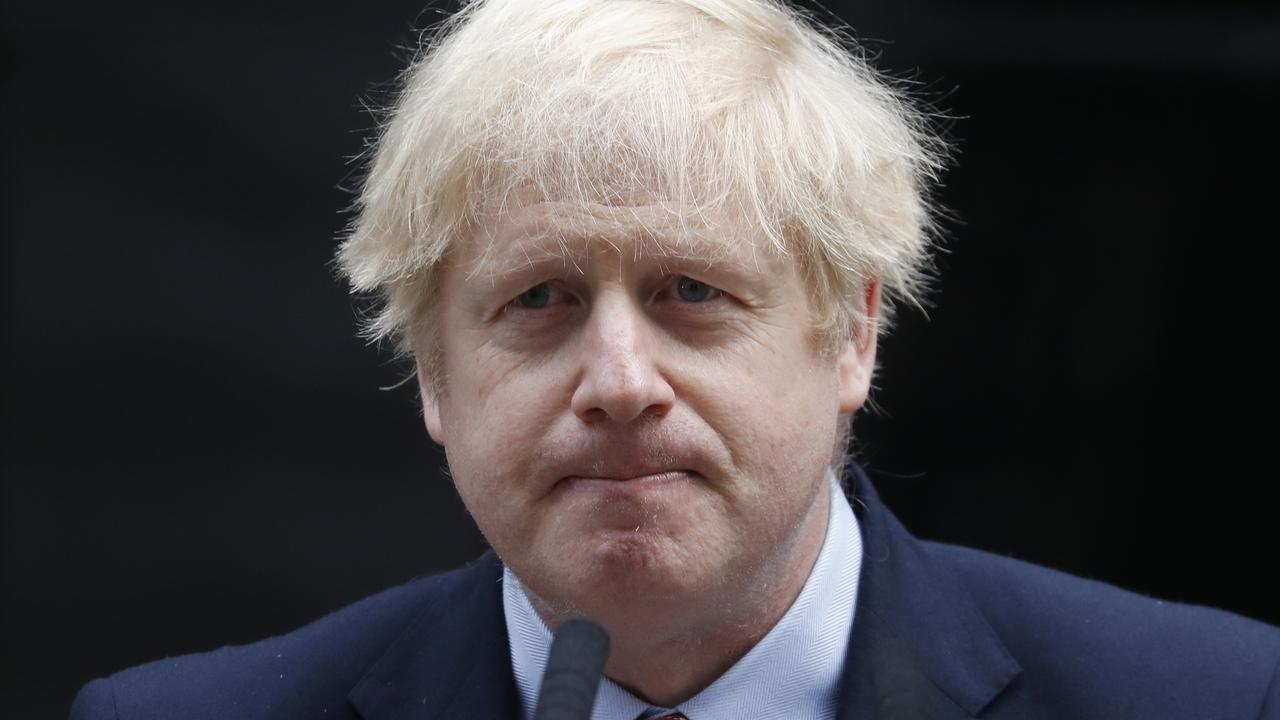 British Prime Minister Boris Johnson finishes making a statement on his first day back at work in Downing Street, London, after recovering from a bout with the coronavirus that put him in intensive care, Monday, April 27, 2020. The highly contagious COVID-19 coronavirus has impacted on nations around the globe, many imposing self isolation and exercising social distancing when people move from their homes. (AP Photo/Frank Augstein)