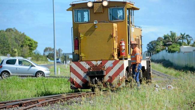 SUGAR RUSH: Cane train driver's assistant Robert Smith sees out the season close on the cane railway.Photo: Max Fleet / NewsMail. Picture: Max Fleet BUN101115CANE5