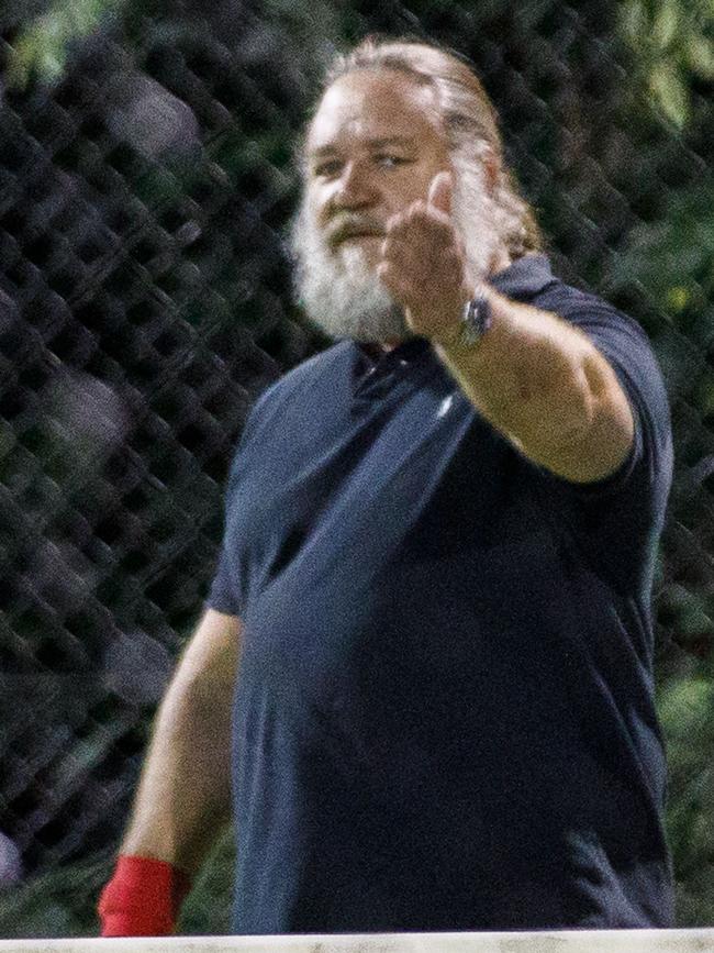 Russell Crowe enjoying a game of tennis in Paddington. Picture: Tim Pascoe