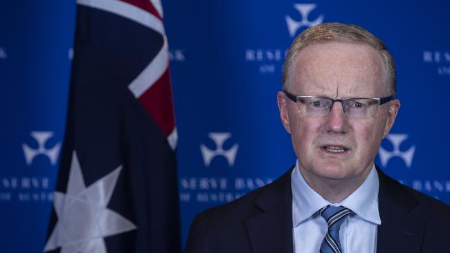 Reserve Bank governor Philip Lowe: There is a fine but important distinction between defending the currency with QE and MMT. Picture: AFR photo LOUIE DOUVIS