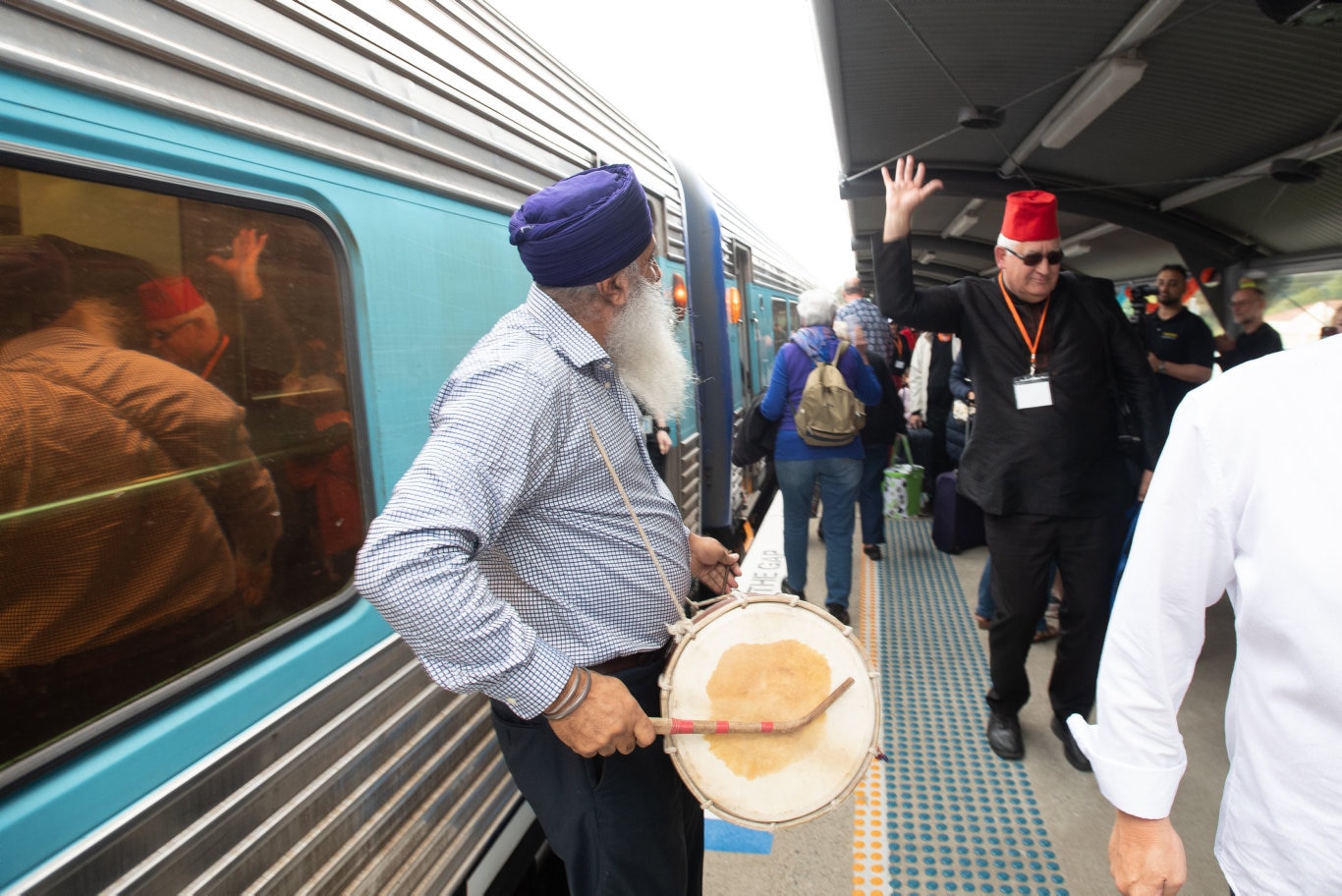 The Bollywood Express rolls into Coffs Harbour Train Station and is welcolmed by the Dance drumming of councillor John Arkan.. 26 SEPT 2019