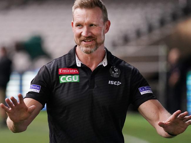 Magpies head coach Nathan Buckley tells media to keep their regulatory distance during the Round 1 AFL match between Western Bulldogs and Collingwood Magpies at Marvel Stadium in Melbourne, Friday, March 20, 2020. (AAP Image/Michael Dodge) NO ARCHIVING, EDITORIAL USE ONLY