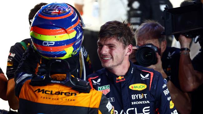 Max and Oscar celebrate. (Photo by Clive Rose/Getty Images)