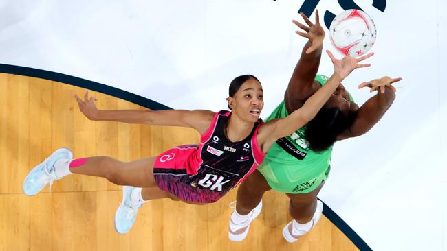 Shamera Sterling of the Thunderbirds and Jhaniele Fowler of the Fever contest the ball. Getty Images)