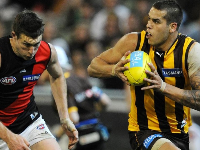 Lance Franklin starts his incredible run from the wing in front of Cale Hooker to kick a miracle goal.