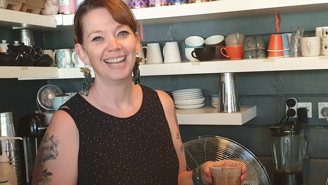 The Wayzgooze Cafe manager Rebecca Alchin serving customers in trade quiet Leura. Picture: Isabell Petrinic